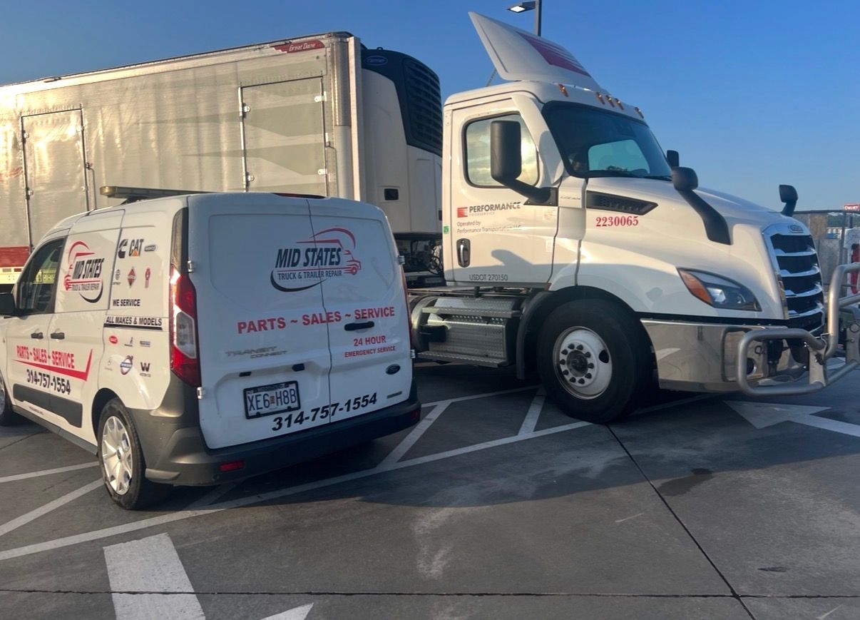 Mid States service van working on a trailer